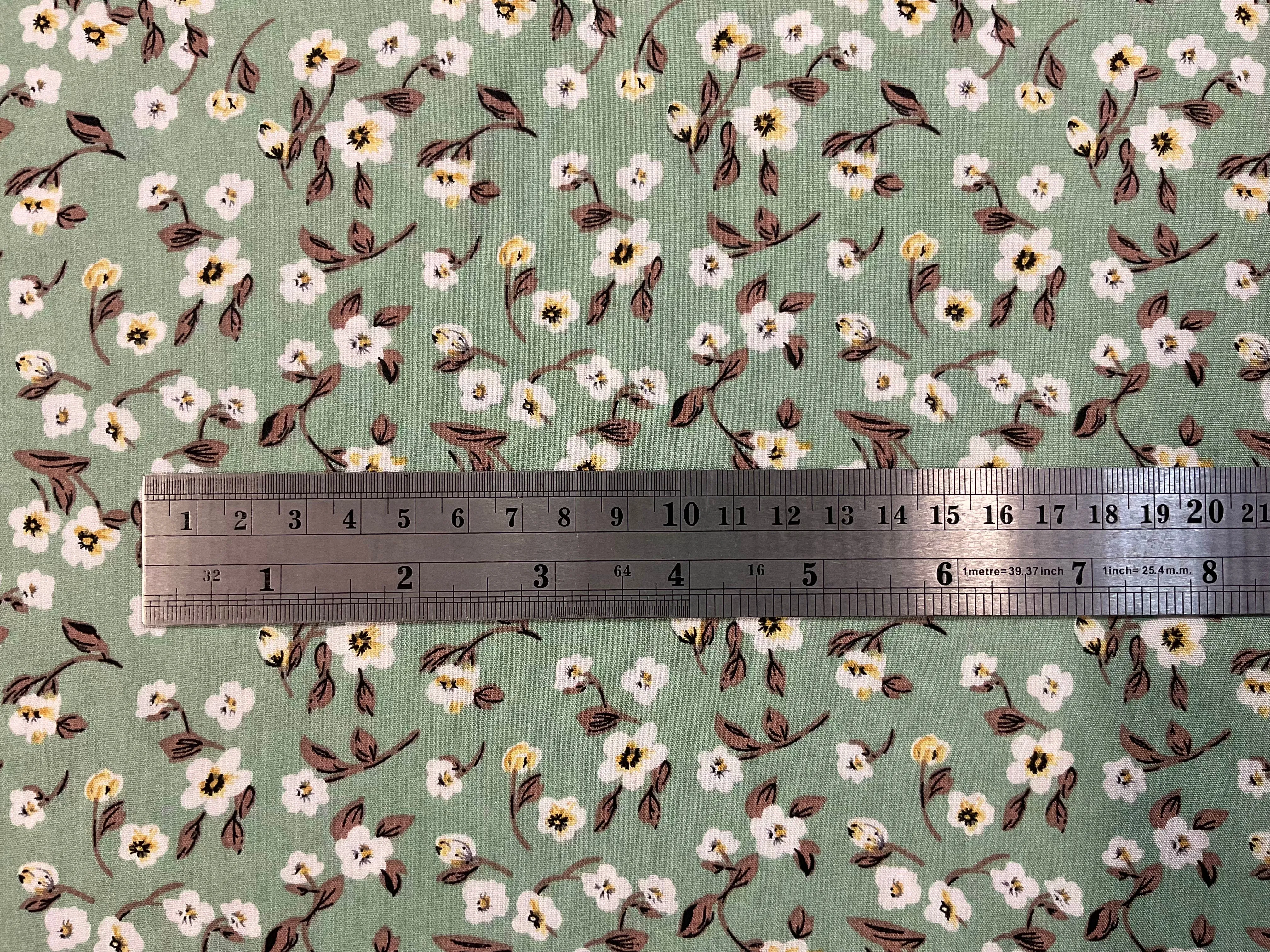 White Flowers on Mint Green Viscose